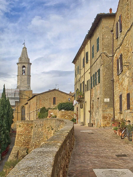 Italy, Tuscany, Pienza. Walkway leading to the bell tower of the Pienza cathedral