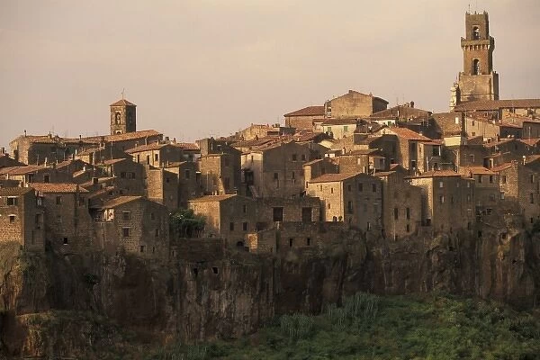 Italy, Tuscany, Pitigliano. Town view in late afternoon light