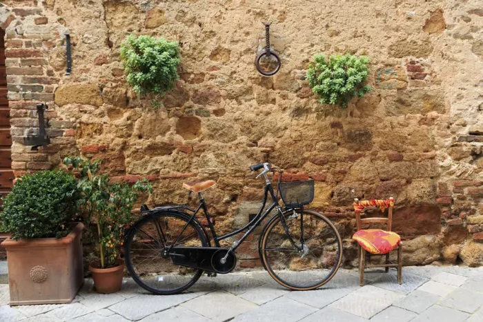 Framed Print : Italy, Tuscany, province of Siena, Chiusure. Hill town. Bicycle leans against stone wall Framed Print : Italy, Tuscany, province of Siena, Chiusure. Hill town. Bicycle leans against stone wall