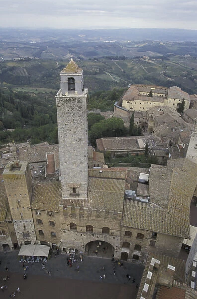 Italy, Tuscany, San Gimignano 13th C. towers and plaza in hill town viewed