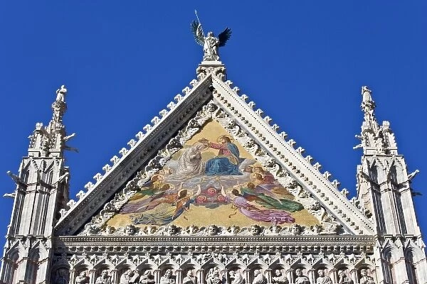 Italy, Tuscany, Siena. Close-up of artwork on front facade of the Duomo cathedral