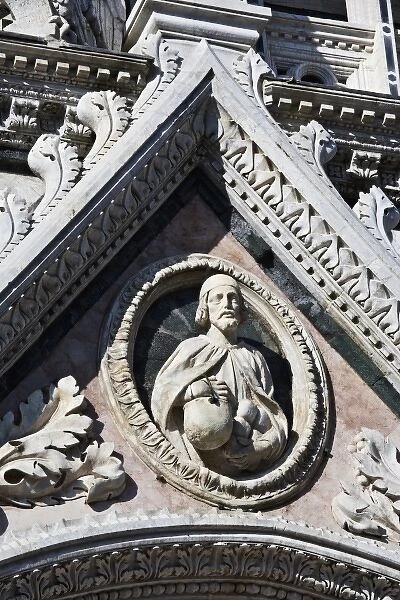 Italy, Tuscany, Siena. Close-up of front facade of the Duomo cathedral