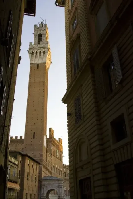 Framed Print : Italy, Tuscany, Sienna. Looking down a narrow street at the Torre del Mangia framed by buildings Framed Print : Italy, Tuscany, Sienna. Looking down a narrow street at the Torre del Mangia framed by buildings