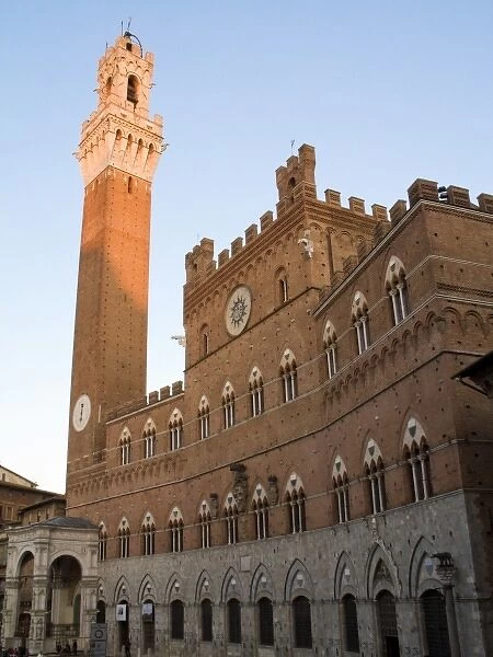 Italy, Tuscany, Sienna. Torre del Mangia at sunset