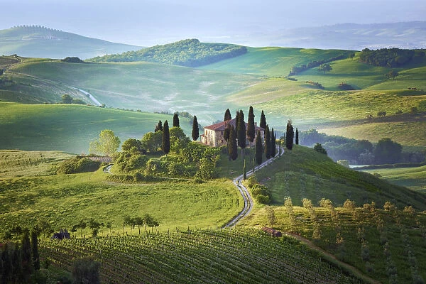 Italy, Tuscany, Val d Orcia. Landscape with Podere Belvedere house. Credit as