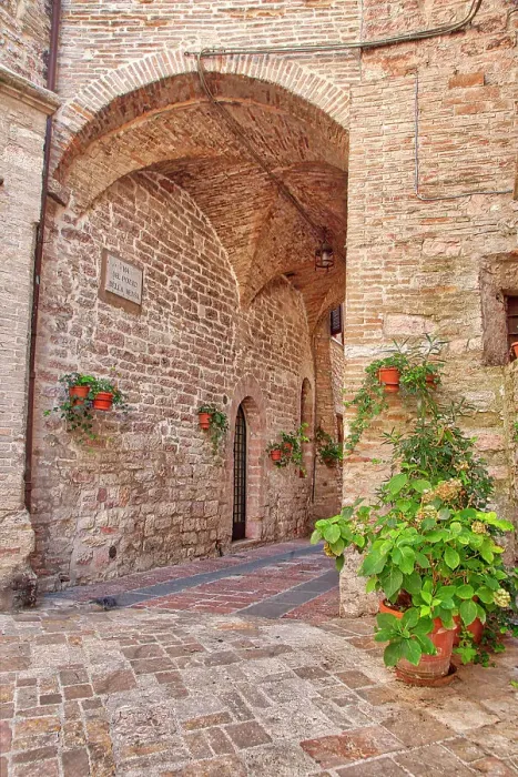 Framed Print : Italy, Umbria. Archway with potted flowers in the streets of Assisi Framed Print : Italy, Umbria. Archway with potted flowers in the streets of Assisi