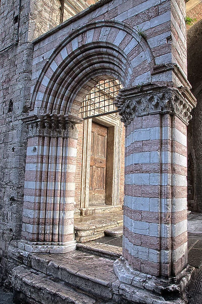 Italy, Umbria, Perugia. Striped archway near the Cathedral of San Lorenzo in Piazza IV Novembre