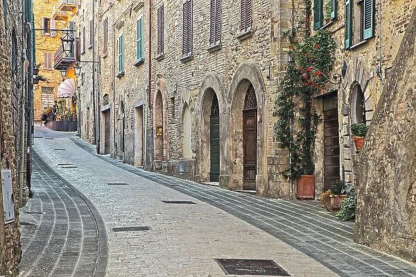 Italy, Umbria. Street leading up to the main square in the historic town of Montone
