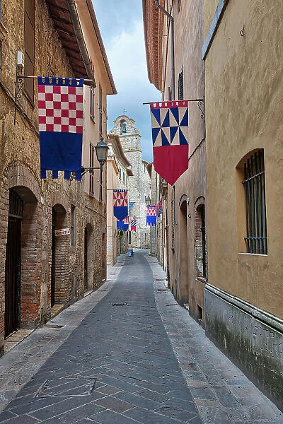Italy, Umbria. Streets in the historic district of San Gemini decked out with festival jousting flags