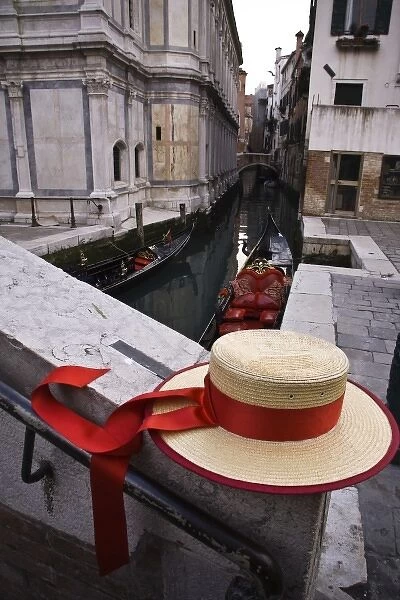 Italy, Veneto, Venice. Gondoliers hat and gondolas on canal