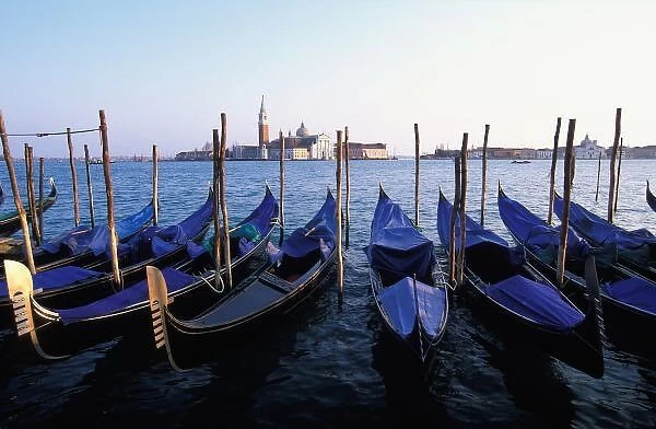 Italy, Veneto, Venice, Row of Gondolas and San Giorgio Maggiore