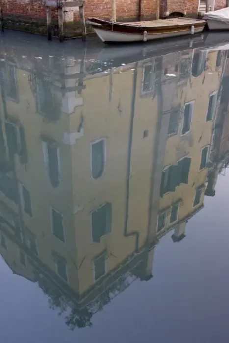 Framed Print : Italy, Venice. Building and boat reflected in still canal Framed Print : Italy, Venice. Building and boat reflected in still canal