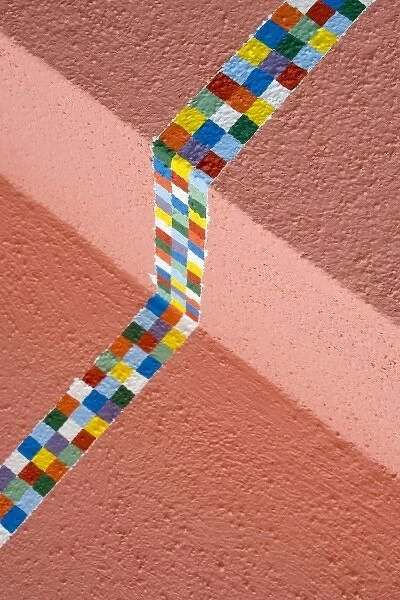 Italy, Venice, Burano. Colorful checkered border painted on a house
