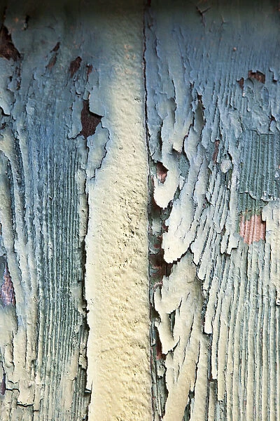 Italy, Venice, Burano Island. Patterns of peeling paint on old wooden doors