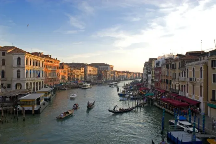 Framed Print : Italy; Venice. The bustling riverfront along the Grand Canal in Venice at sunrise Framed Print : Italy; Venice. The bustling riverfront along the Grand Canal in Venice at sunrise