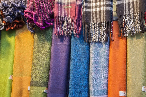 Italy, Venice. Colorful scarfs on display and for sale along the streets of Venice