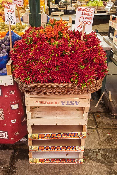 Italy, Venice. Colorful spicy peppers (pepperoncini) on display and for sale in the Rialto Market