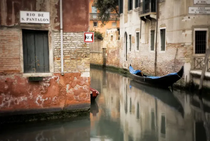 Framed Print : Italy, Venice. Gondola moored in canal. Credit as: Jim Nilsen  /  Jaynes Gallery  /  DanitaDelimont