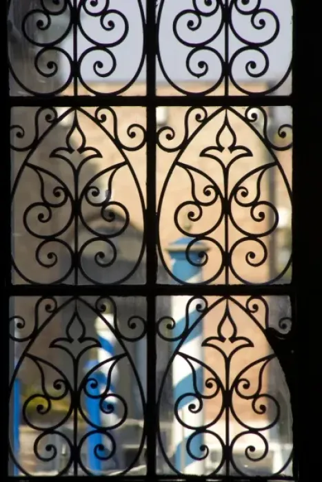Framed Print : Italy, Venice. Gondola posts seen through decorative iron gates at the Arsenale Framed Print : Italy, Venice. Gondola posts seen through decorative iron gates at the Arsenale