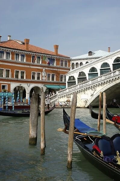 Italy, Venice, gondolas on Grand Canal by Rialto Bridge