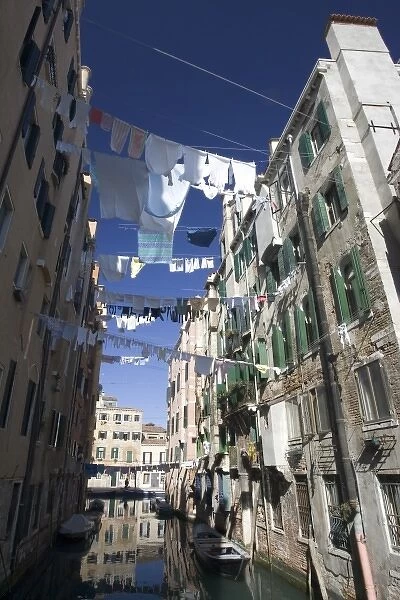 Italy, Venice. Laundry strung between buildings in the Ghetto