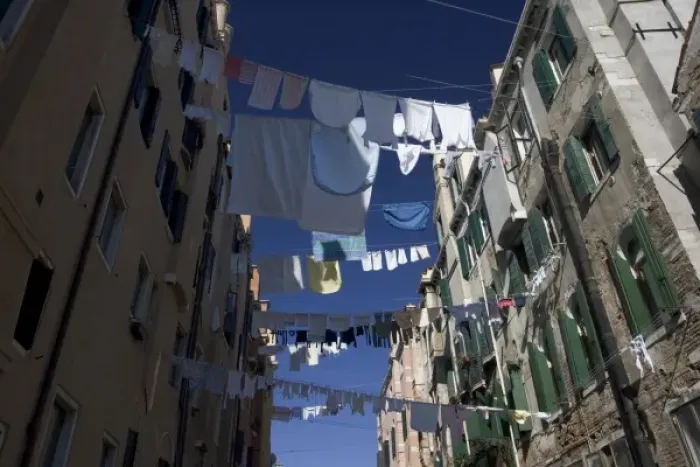 Framed Print : Italy, Venice. Laundry strung between buildings in the Ghetto