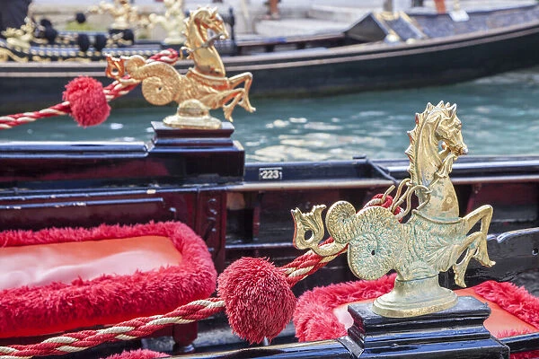 Italy, Venice. Detail of a very ornate gondola boat
