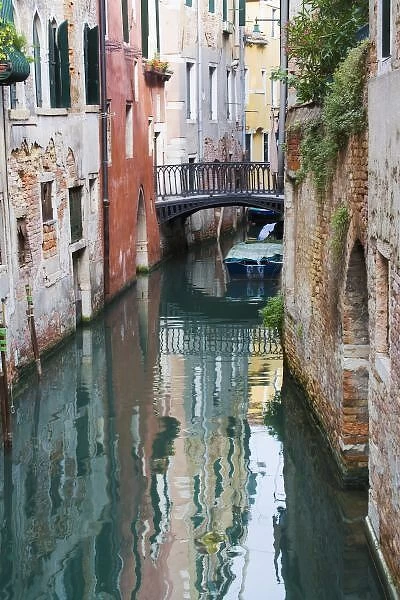 Italy, Venice, Reflections and Small Bridge of Small Canal of Venice