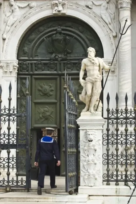 Framed Print : Italy, Venice. Sailor entering naval base Framed Print : Italy, Venice. Sailor entering naval base
