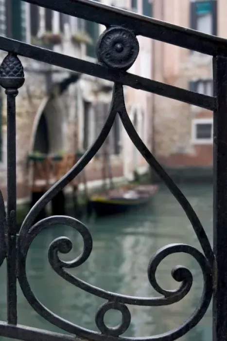 Framed Print : Italy, Venice. Stair railing metalwork design frames canal with gondola