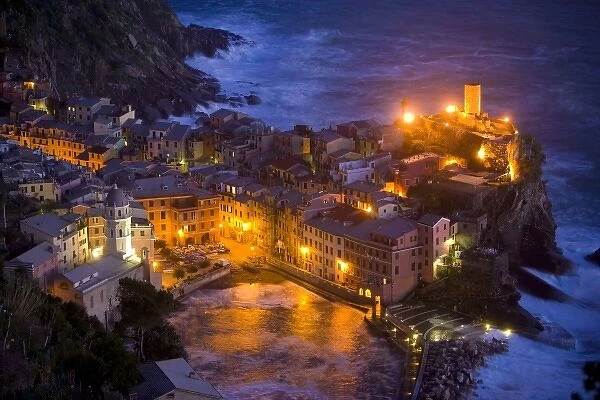 Italy, Vernazza, Cinque Terra. Overview of city lit at night
