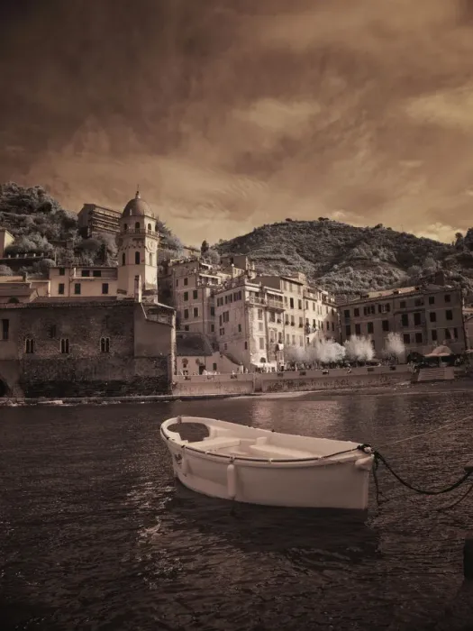 Framed Print : Italy, Vernazza. Infrared image of a boat in the harbor of Vernazza with the church in Framed Print : Italy, Vernazza. Infrared image of a boat in the harbor of Vernazza with the church in
