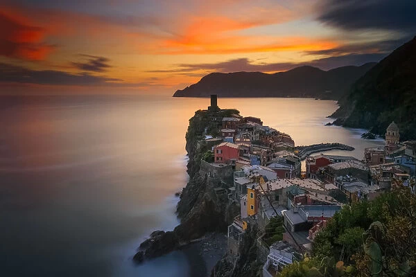 Italy, Vernazza. Overview of coastal town at sunset