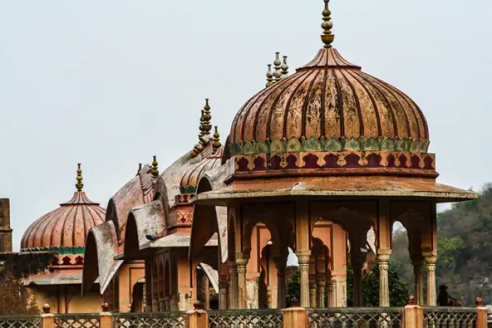 Framed Print : Jaipur, Rajasthan, India. Monkey sits on ledge at ancient Galtaji Temple in India