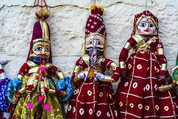 Jaisalmer, Rajasthan, India. Mughal paper mache dolls and puppets wearing colorful