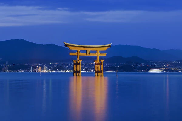 Japan, Miyajima, Itsukushima Shrine, Twilight Floating Torii Gate