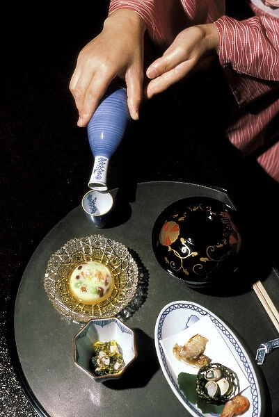Japan, Tokyo. Sake service, and delicacies