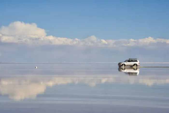 Framed Print : Jeep driving on the reflected surface of the salt flat, Salar de Uyuni, Potosi Department Framed Print : Jeep driving on the reflected surface of the salt flat, Salar de Uyuni, Potosi Department