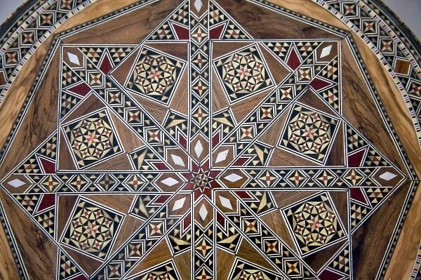 Jordan, Madaba. Wood mosaic head rest with 16th Century Egyptian-Turkish design produced
