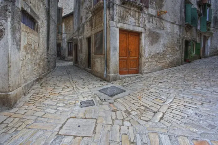 Framed Print : Juncture of two cobblestone streets forming a fork in the road, Rovigno, Croatia