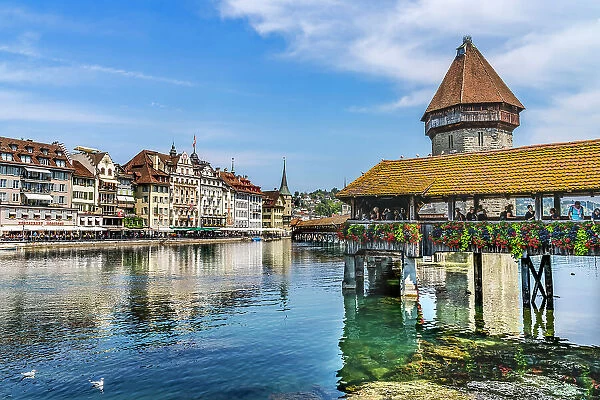 Kapellbrucke over Reuss River, Lucerne, Switzerland. Built in 1365 almost burned down in 1993. (Editorial Use Only)