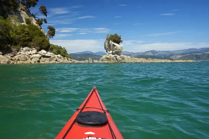 Framed Print : Kayak and Fisherman Island, Abel Tasman National Park, Nelson Region, South Island