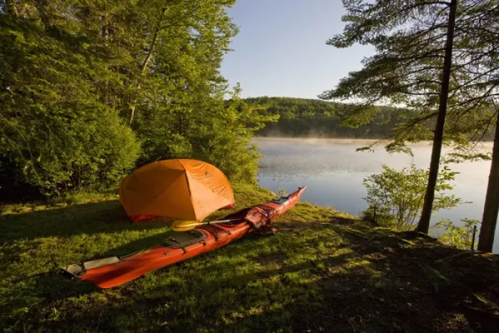 Framed Print : A kayak and a tent next to the Androscoggin River at a remote campsite at Mollidgewock Framed Print : A kayak and a tent next to the Androscoggin River at a remote campsite at Mollidgewock