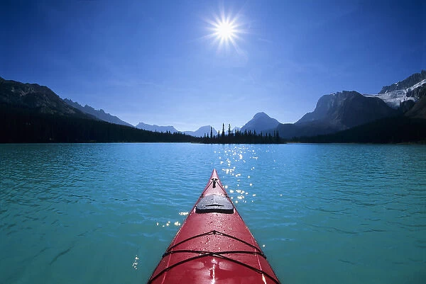 Kayaking on Bow Lake in the Canadian Rockies of Banff National Park, Alberta, Canada