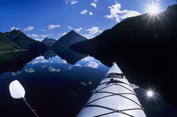 Kayaking on Murtle Lake, Caribou Mountains; Wells Gray Provincial Park, British Columbia