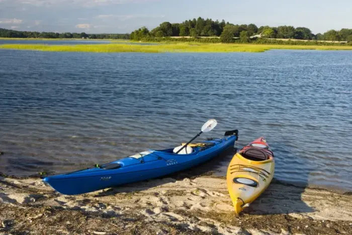 Framed Print : Kayaks on the beach at Griswold Point in Old Lyme, Connecticut. Mouth of the Connecticut River