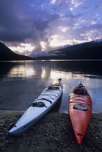 Kayaks at sunset on Rainbow Falls Beach on Azure Lake in Wells Gray Provincial Park
