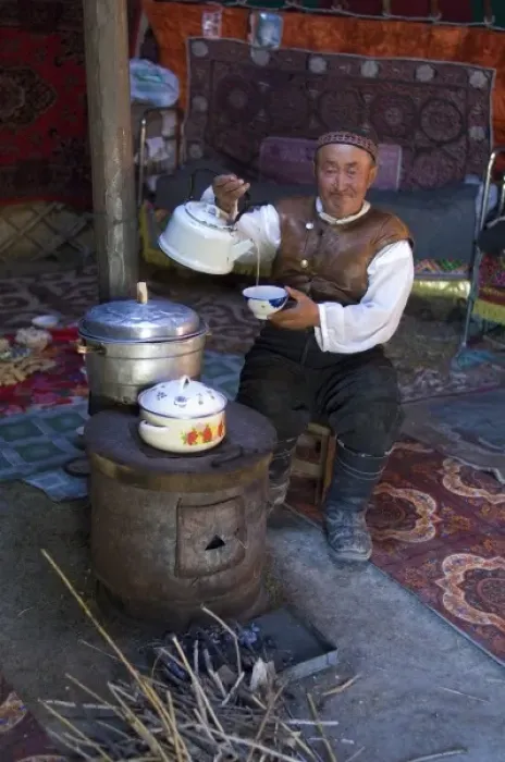 Framed Print : Kazakh man drinking tea in his yurt. (MR) Framed Print : Kazakh man drinking tea in his yurt. (MR)