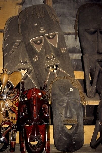 Kenya, Malindi. Woodcarvers Co-op, carved wooden masks for sale