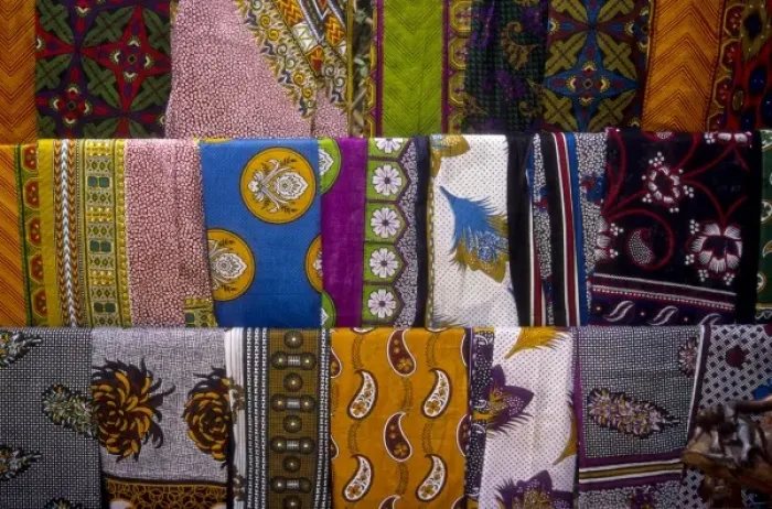 Framed Print : Kenya, Namanga, hanging kanga fabrics for sale Framed Print : Kenya, Namanga, hanging kanga fabrics for sale